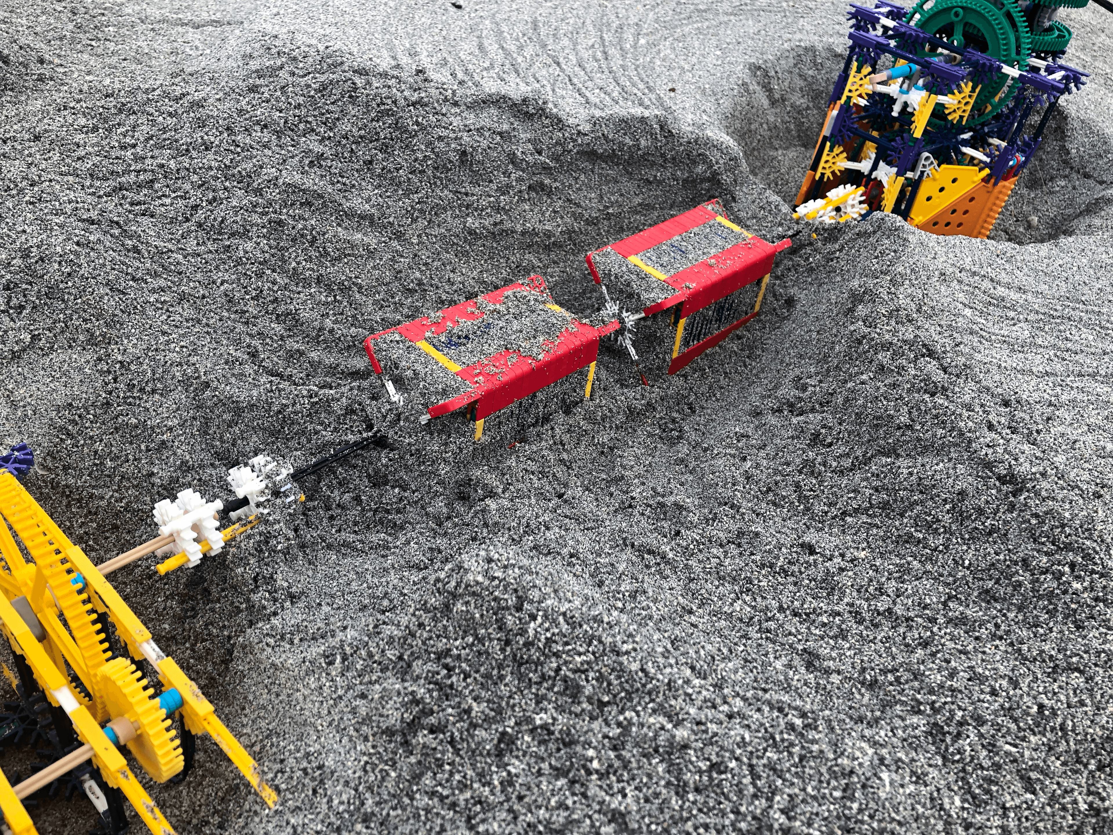 Boxed-in shaft connection running through the sand